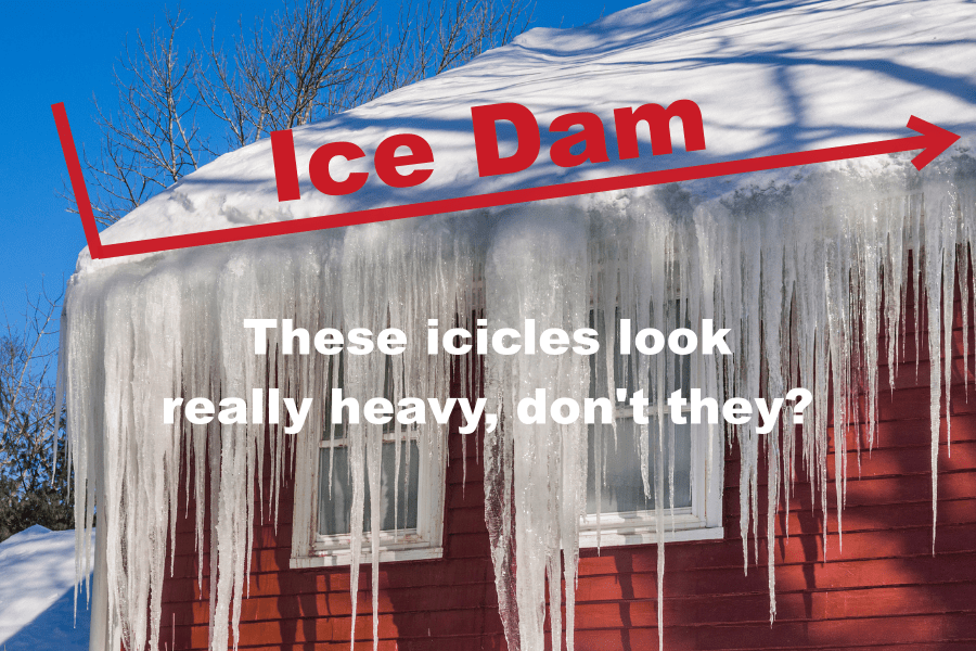 roof raking. Image of an ice dam on a red house with lots of heavy icicles. 