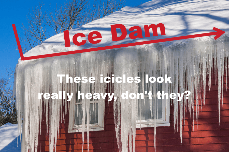 roof raking. Image of an ice dam on a red house with lots of heavy icicles.