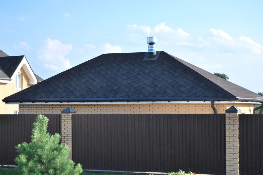 material for garage roofs showing a hip style roof on a garage.