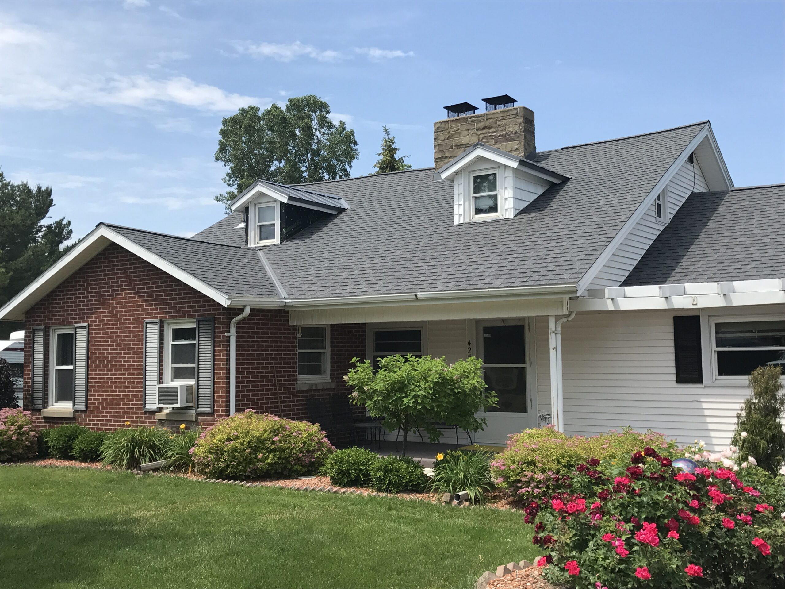 Asphault roof with steel accents